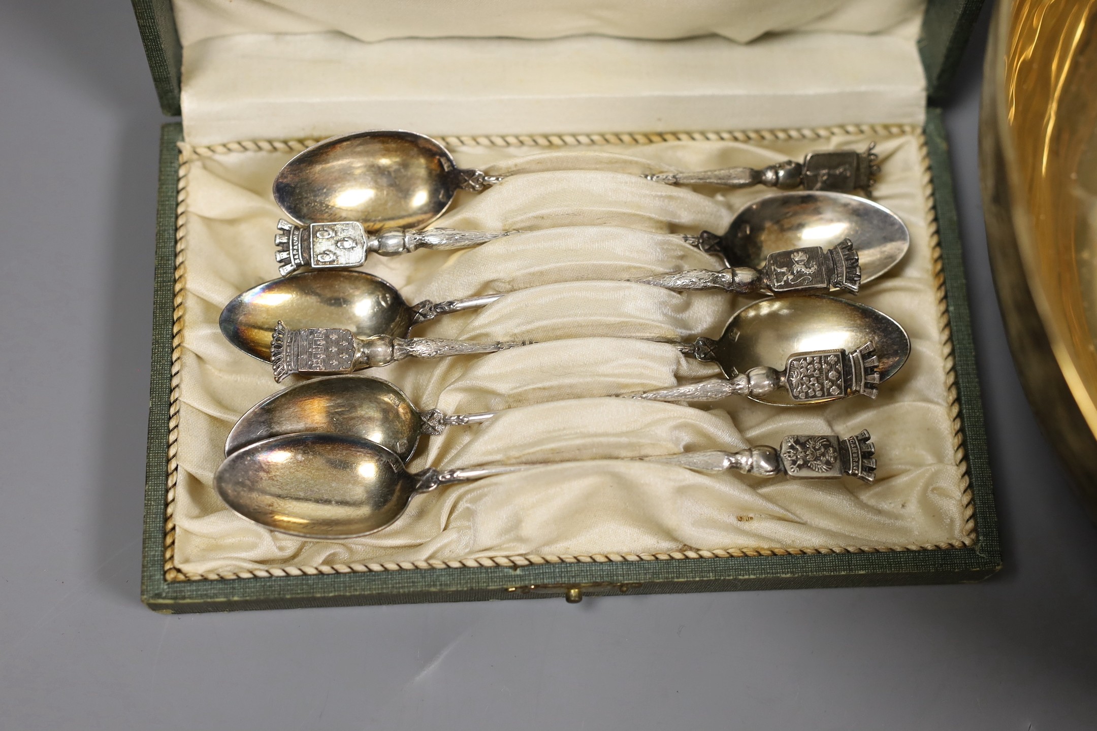 Assorted silver and other items including two silver mounted photograph frames, a Georgian silver mustard by John Eames, a graduated suite of three Victorian silver mounted horn beakers, a silver candle extinguisher, a c